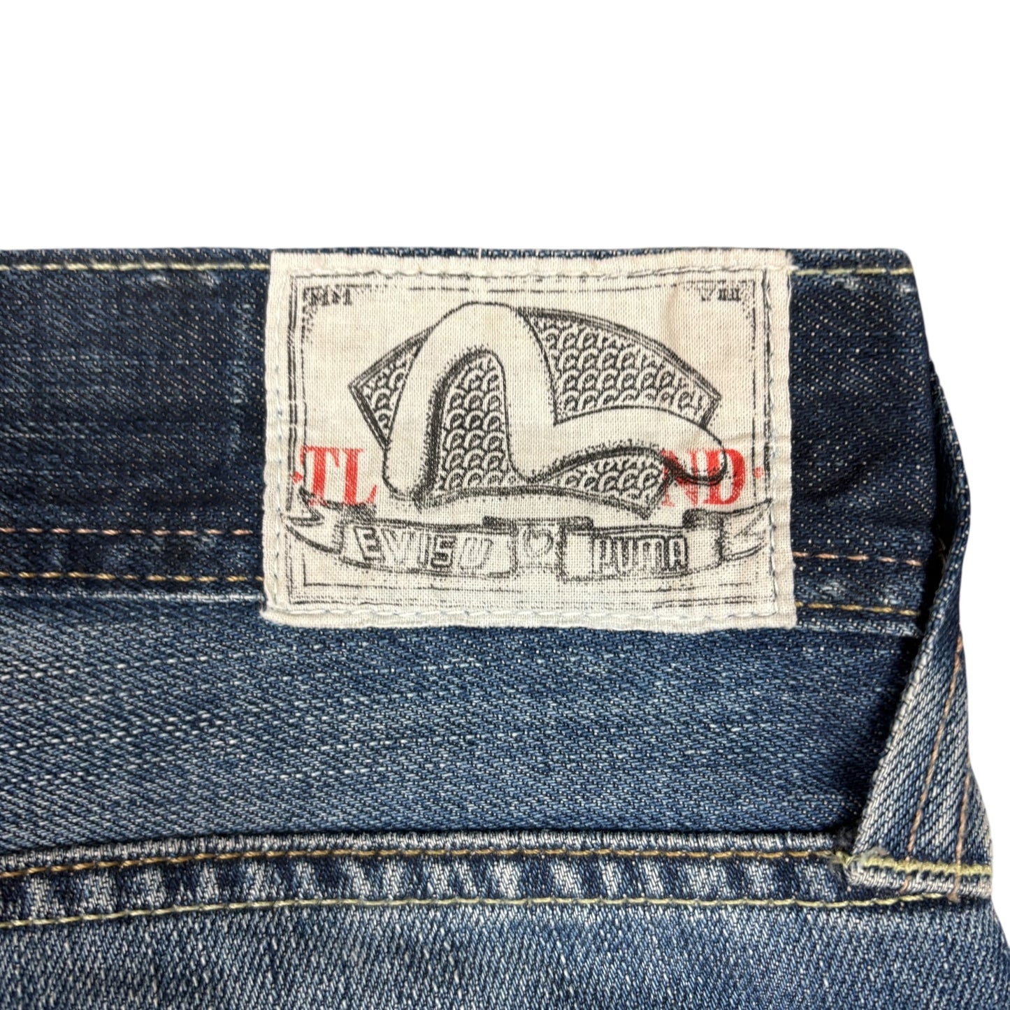 Vintage Evisu x Puma Jeans (M-L)